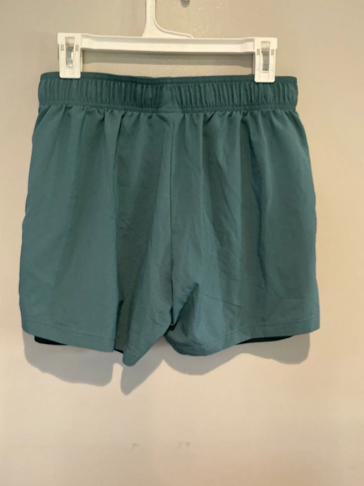 Pantalones Cortos de Entrenamiento Gymshark Mujer Medianos Verde Cintura Elástica Poliéster Foto 2 de 4