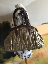 Très joli sac cuir et toile MANOUKIAN kaki/marron en bon état.