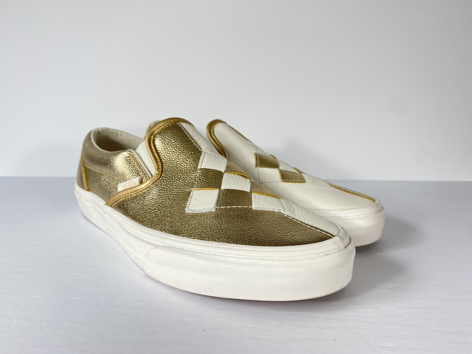 gold slip on vans