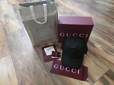 Authentic mens Gucci hat new with box and rec...