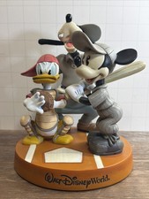 Disney bobble head with Mickey, Donald and go...