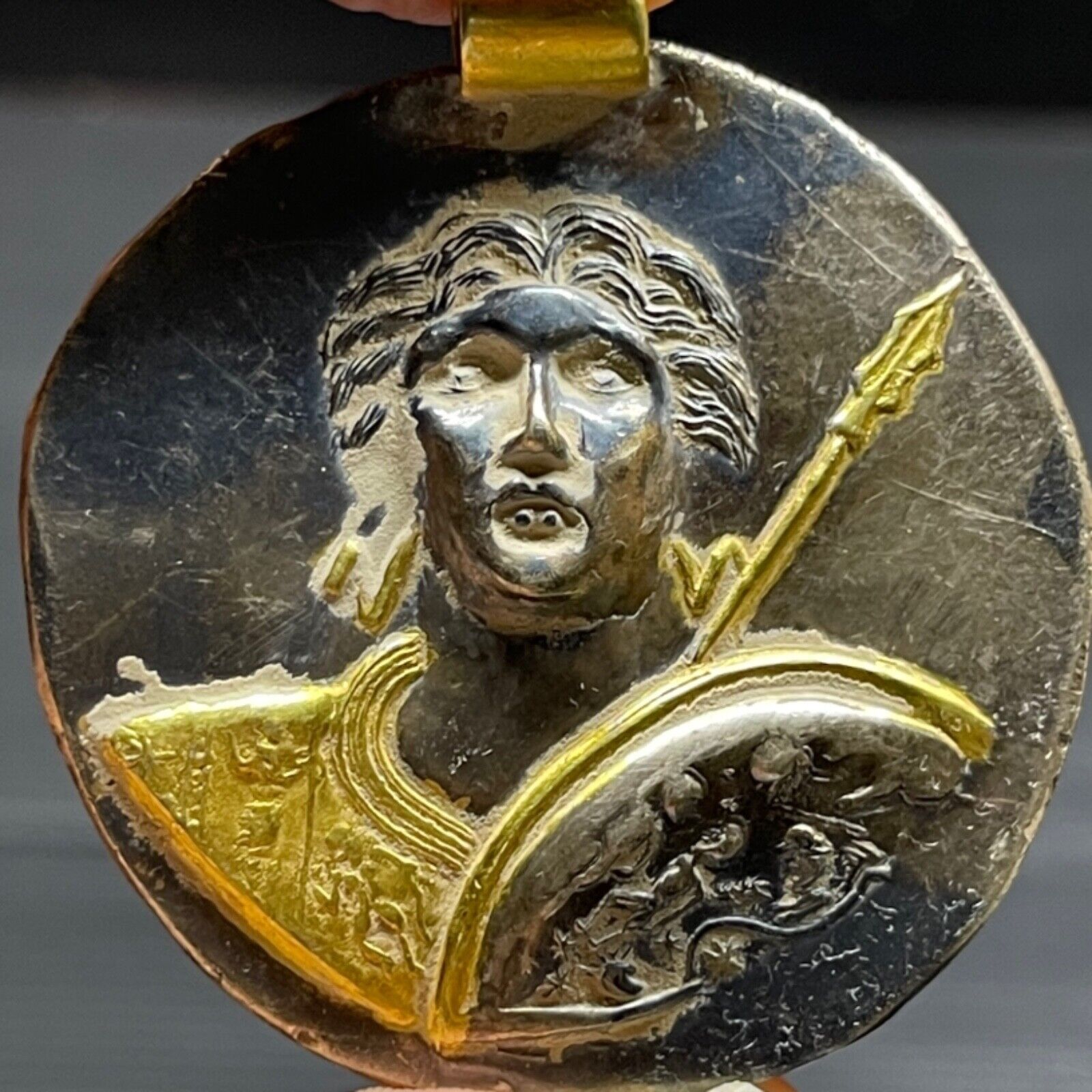 Ancient Greek gold and silver pendant depicting young Alexander