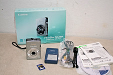 Canon PowerShot SD750 7.1MP Digital Camera W/ Battery, SD Card & Charger