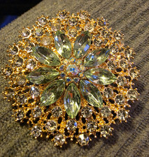Gold-tone flower starburst brooch pin, green marquise rhinestones, 1.5"