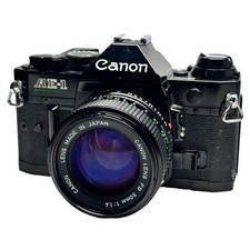 Excellent Condition Canon AE 1 PROGRAM Black New FD 50mm F1.4 Film Camera Body
