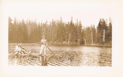 VTG Photo Handsome Man Beautiful Women Makeshift Raft Poles Lake Forest