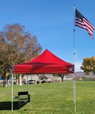 Canopy flag pole mount for portable canopies.