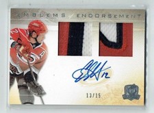 09-10 UD The Cup Emblems of Endorsement  Eric Staal  /15  Dual Patches  Auto