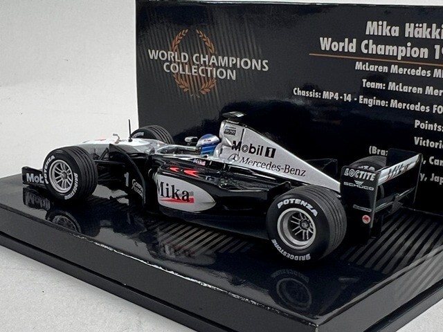 1:43 MINICHAMPS 436990001 McLaren Mercedes MP4-14 World Champion