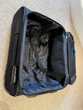 Black Tripp rollerboard suitcase in good condition. Pull-up handle. Cabin size. 