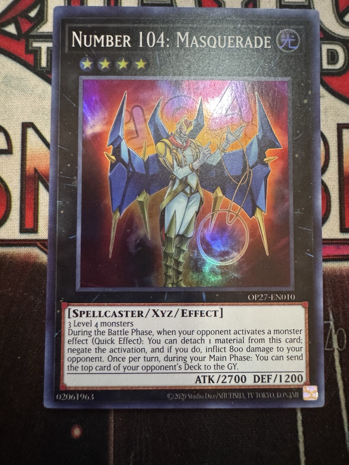 Number 104: Masquerade OP27-EN010 (YuGiOh Tournament Pack 27) — is it worth grading?