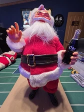 Rubber Face Santa Claus holding a Coca Cola Bottle 16 inches Tall