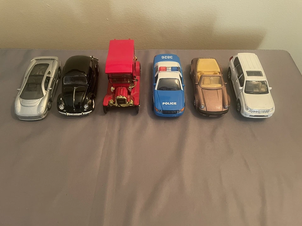 Maisto, Welly, Malibu National Motor Museum Jaguar Xj220 VW Beetle Die cast Cars - Image 1 of 4