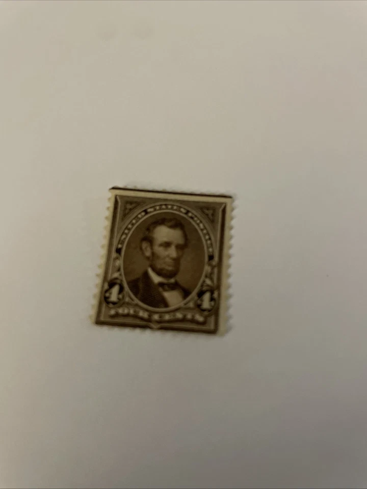 Estampilla postal rara de 4 centavos de Abraham Lincoln marrón oscuro Foto 2 de 2