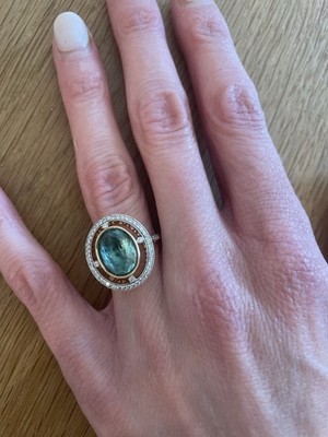 3.99ct Emerald Ring with Diamond halo, set in 18 ct yellow gold  