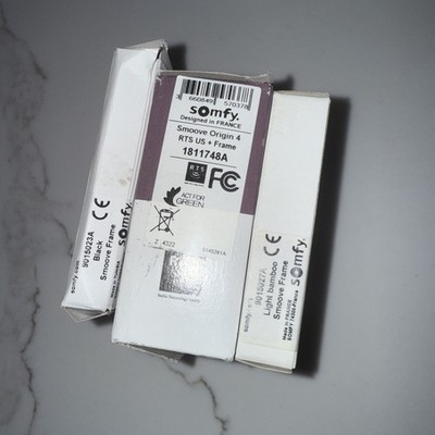 Somfy Smoove Origin 4 Channel RTS Remote with Wall Switch Frame 1811748 - White 