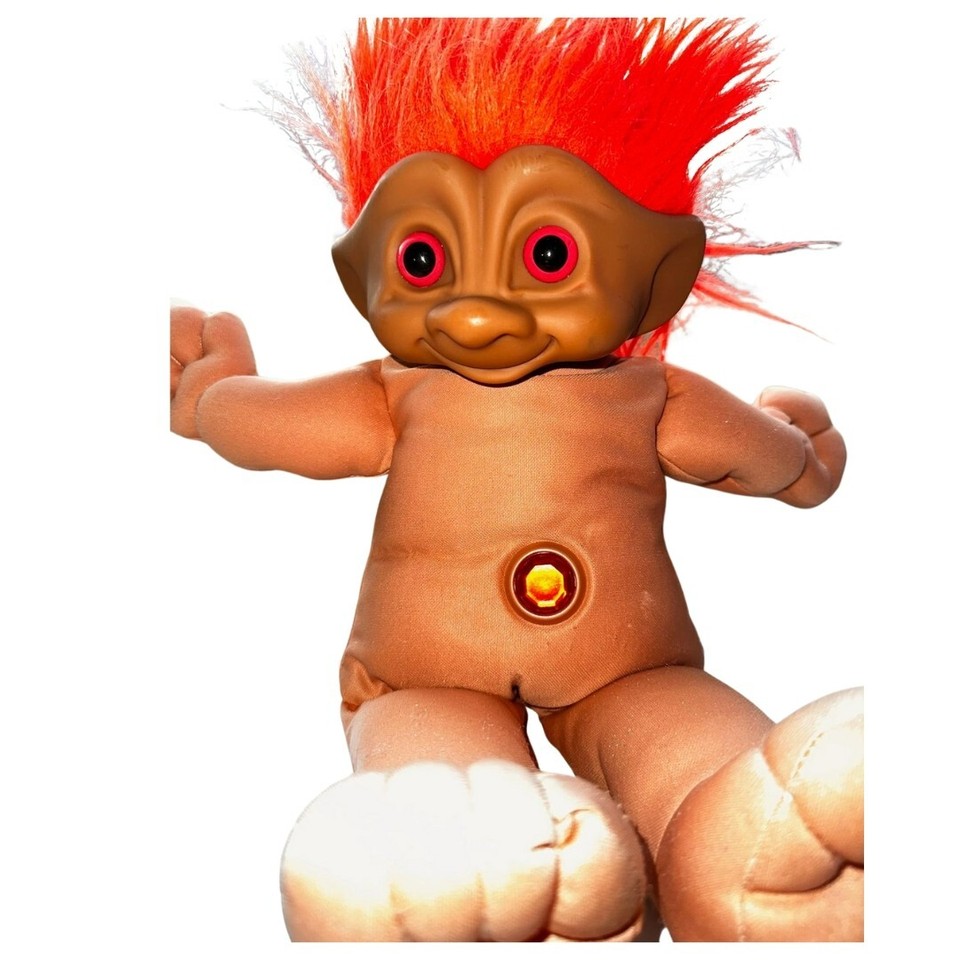 Classic troll doll with wild orange hair — a genuine vintage piece of 20th-century toy nostalgia, not a reproduction.