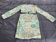 Almost Famous-  Size Large. Floral print, Lined. Mini length, cutouts. Clubwear