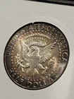 Toned 1964 90% Silver Brilliant Uncirculated Kennedy Half Dollar