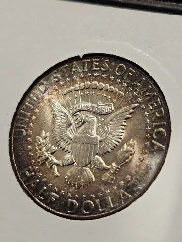 Toned 1964 90% Silver Brilliant Uncirculated Kennedy Half Dollar