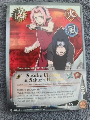 Naruto CCG - Sasuke Uchiha & Sakura Haruno C010,  1st Edition, Gold  Title