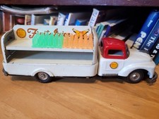NICE 1950's TIN FRICTION POWERED FRUIT JUICE DELIVERY TRUCK