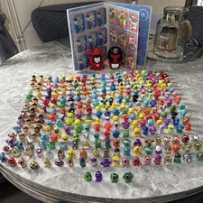 Gogos Crazy Bones bundle collezione enorme lotto lavoro 290+ carte e cartella 