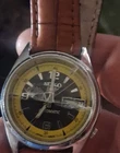 Seiko 5 Men’s Automatic Day/Date Black/Yellow Dial Brown Leather Strap