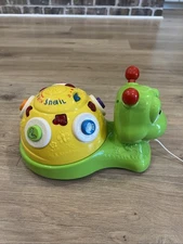 VTech Little Smart Spin 'N Grin Snail developmental pull toy