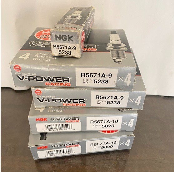 NGK spark plugs lot of 4 boxes 2-R5671a-10 , 2-R5671a-9. 14 mm Thread, 0.750 in