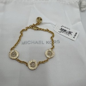 Authentic Michael Kors Gold Plated MK Signature Disc Off White Enamel Bracelet MKJ8218710