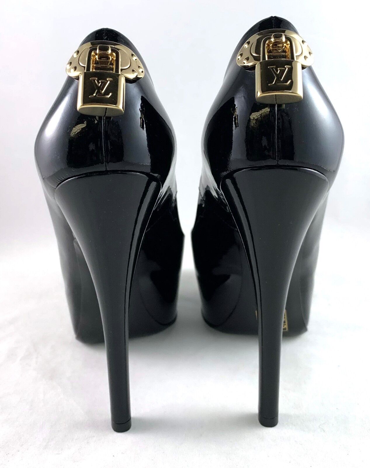 Louis Vuitton “Oh Really” Matte Black Leather Gold Lock Platform Peep Toe  Size 8 - $622 (58% Off Retail) - From Jeremy