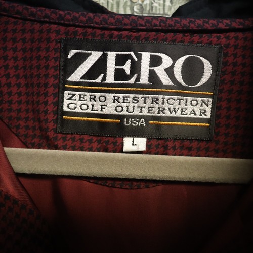 VTG Zero Restriction men’s golf jacket L maroon houndstooth with gray chest panel and visible “ZERO RESTRICTION GOLF OUTWEAR USA” label.