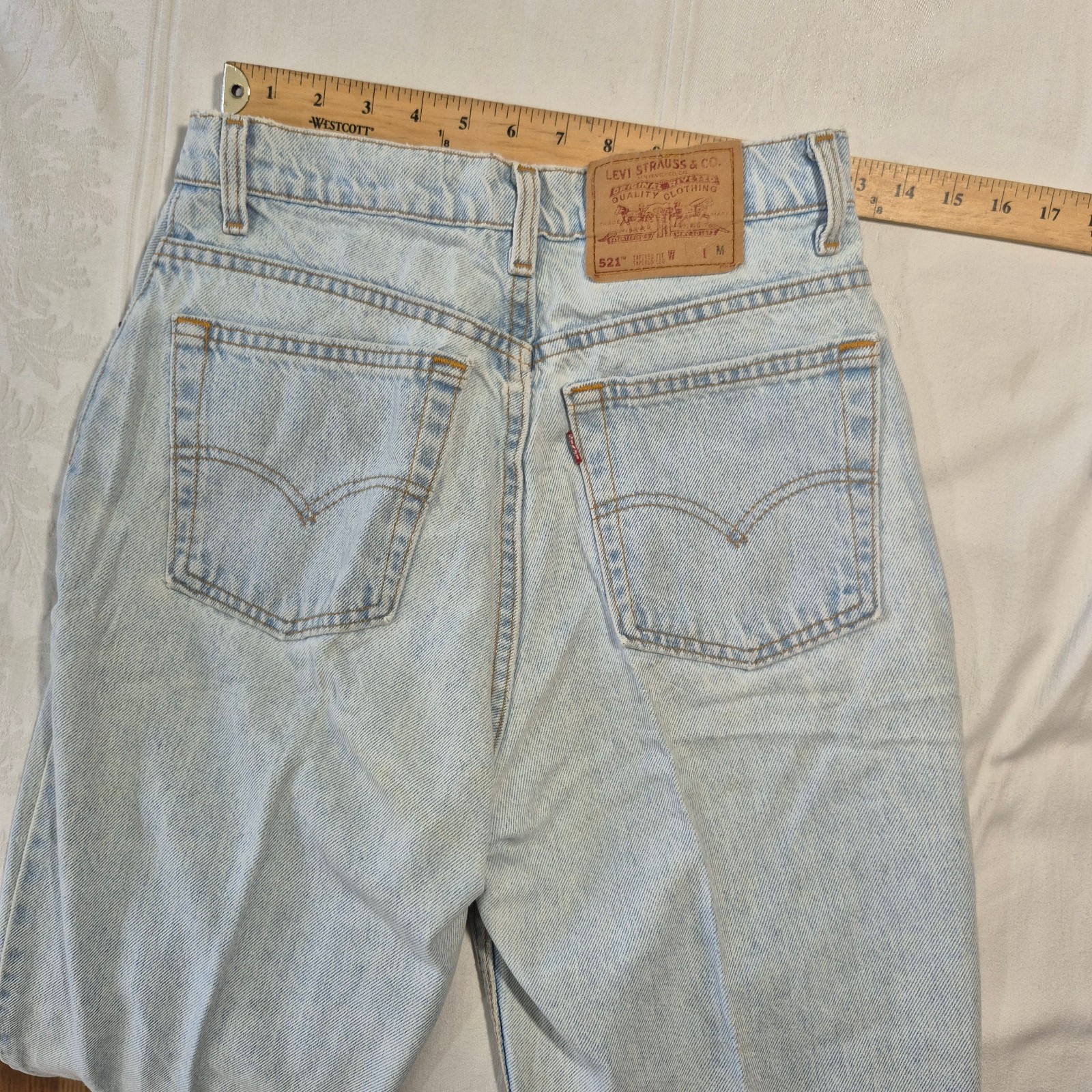 VTG LEVIS 521 JEANS TAPERED FIT and LEG  SIZE 10 28x30 MADE IN USA thumbnail 14