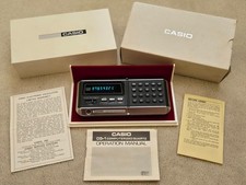 Casio CQ-1 Computerized Quartz Calculator Alarm Clock with box, works perfect