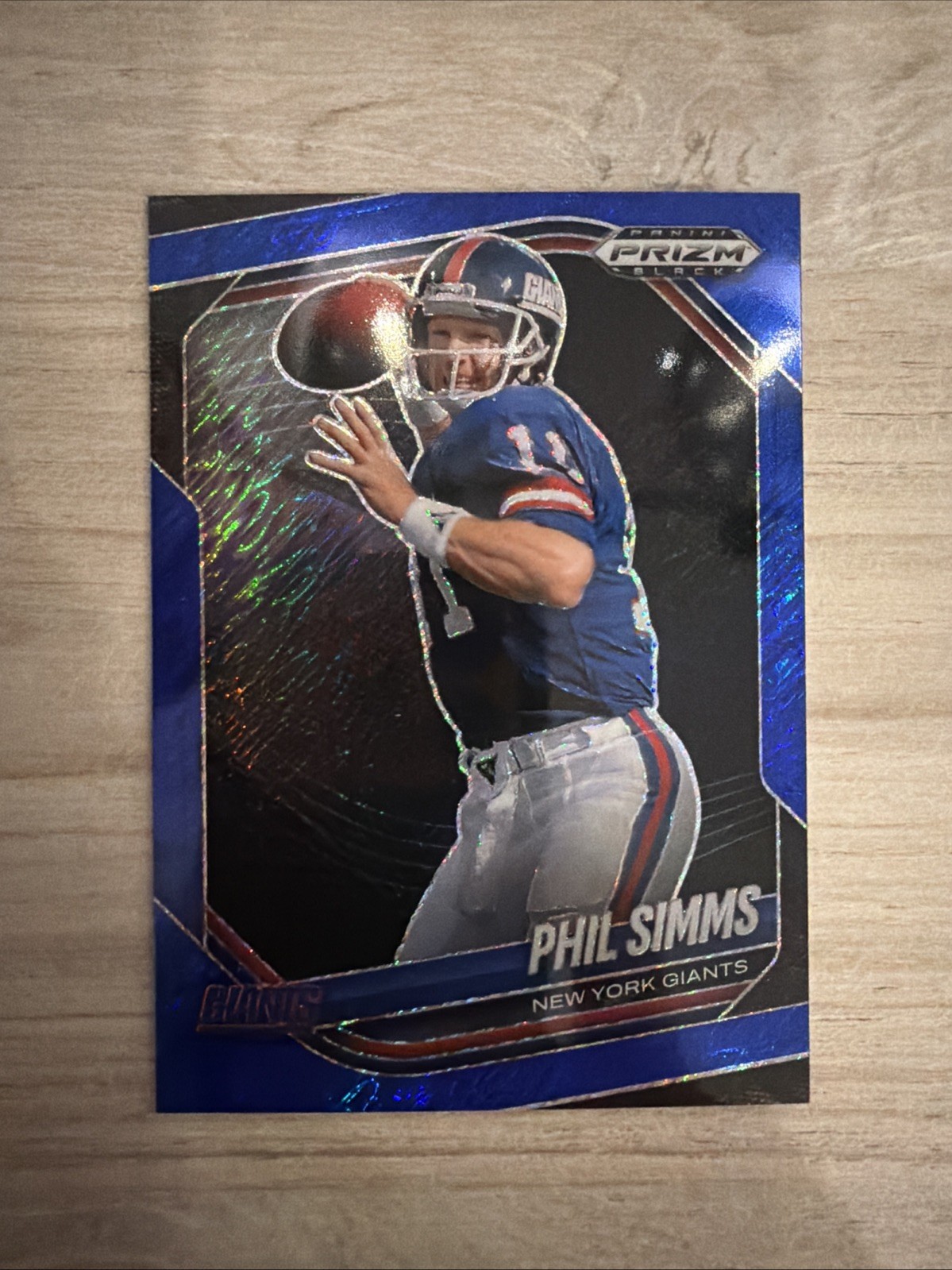 Phil Simms 2025 Panini Prizm Black #103 Blue Shimmer FOTL /35