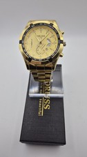 Oruss 1853 men's gold-tone quartz chronograph watch featuring a black tachymetre