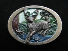 RF09110 VINTAGE 1986  DEER IN FOREST  COMMEMORATIVE ART BELT BUCKLE
