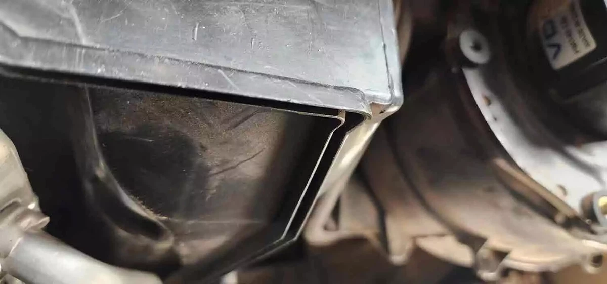 The open HVAC box with the groove for the cover shown.