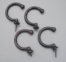 Four enameled under-rail bridge hooks