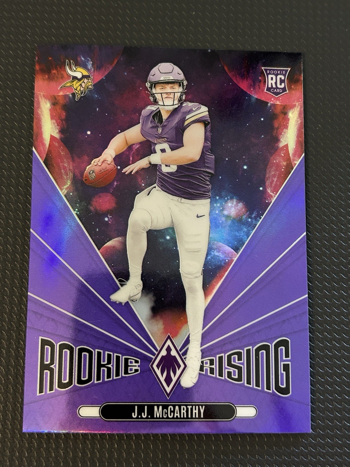 2024 NFL Panini Phoenix Rookie Rising QB JJ McCarthy #RR-JMY Purple (RC)