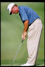 Robin Lee Freeman prepares a shot for the 16th green at the Kemper- Old Photo