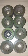 80'S - FASTER BOX GREEN X 7 WHEELS AND GREASE X 1 QUAD SKATE - USED - DIAM. 60MM