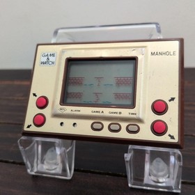 Nintendo Manhole Game & Watch Vintage Handheld Timepiece Collectible Authentic