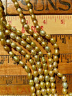 Freshwater Pearls Pale Gold rice 7mm x 9mm 16" Strands