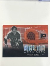2024-25 Upper Deck Artifacts Arena Artifacts Dave Schultz Arena Seat Relic /67