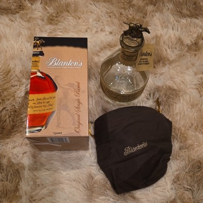 Empty Blanton s Bourbon Whiskey Bottle With  T   Stopper Topper and bag and box.