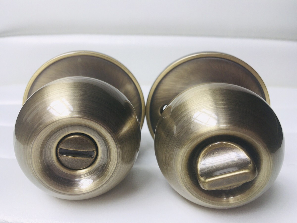 Dexter by Schlage J40CNA609 Corona Bed and Bath Knob Antique Brass