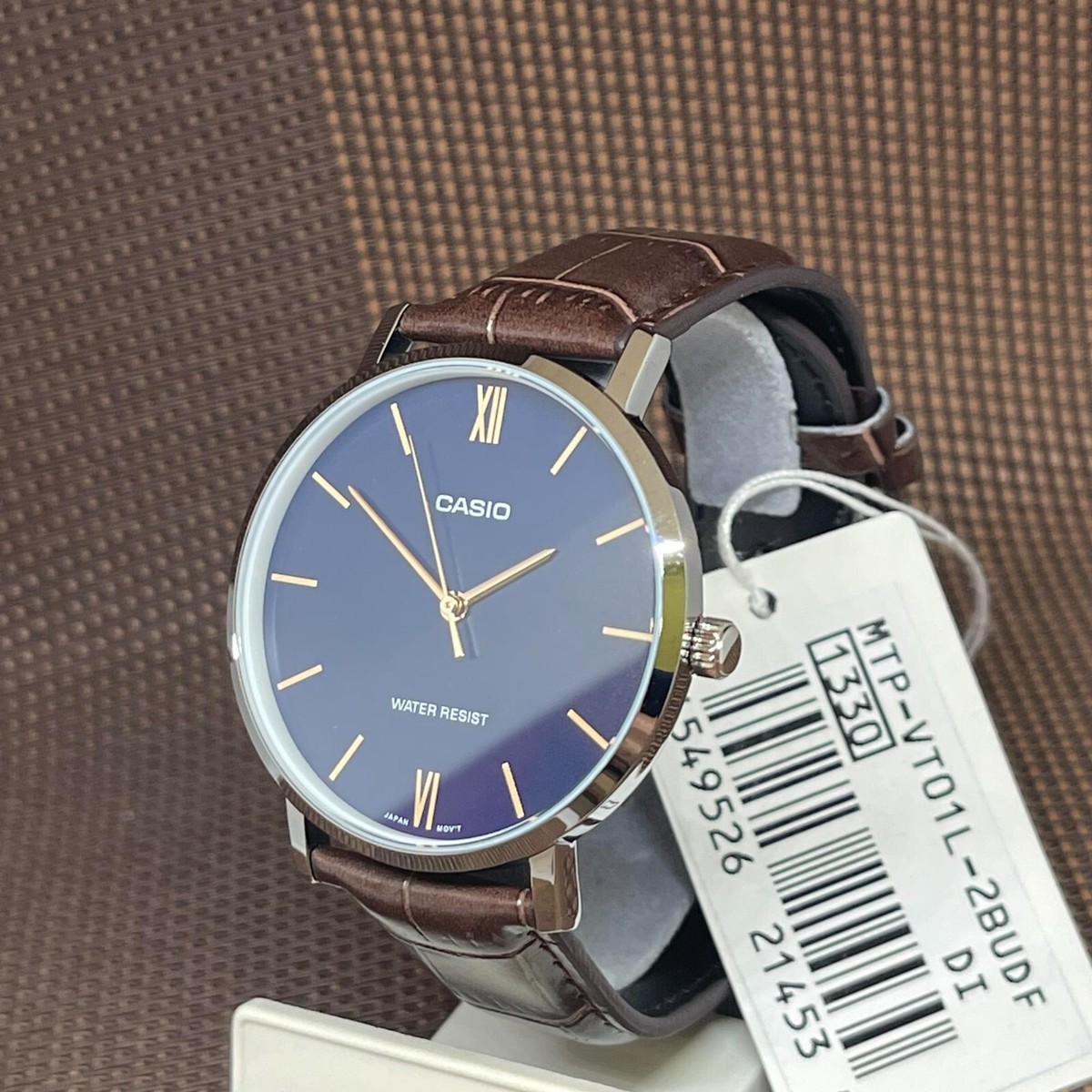 Casio MTP-VT01L-2B Blue Analog Brown Leather Minimalistic Roman