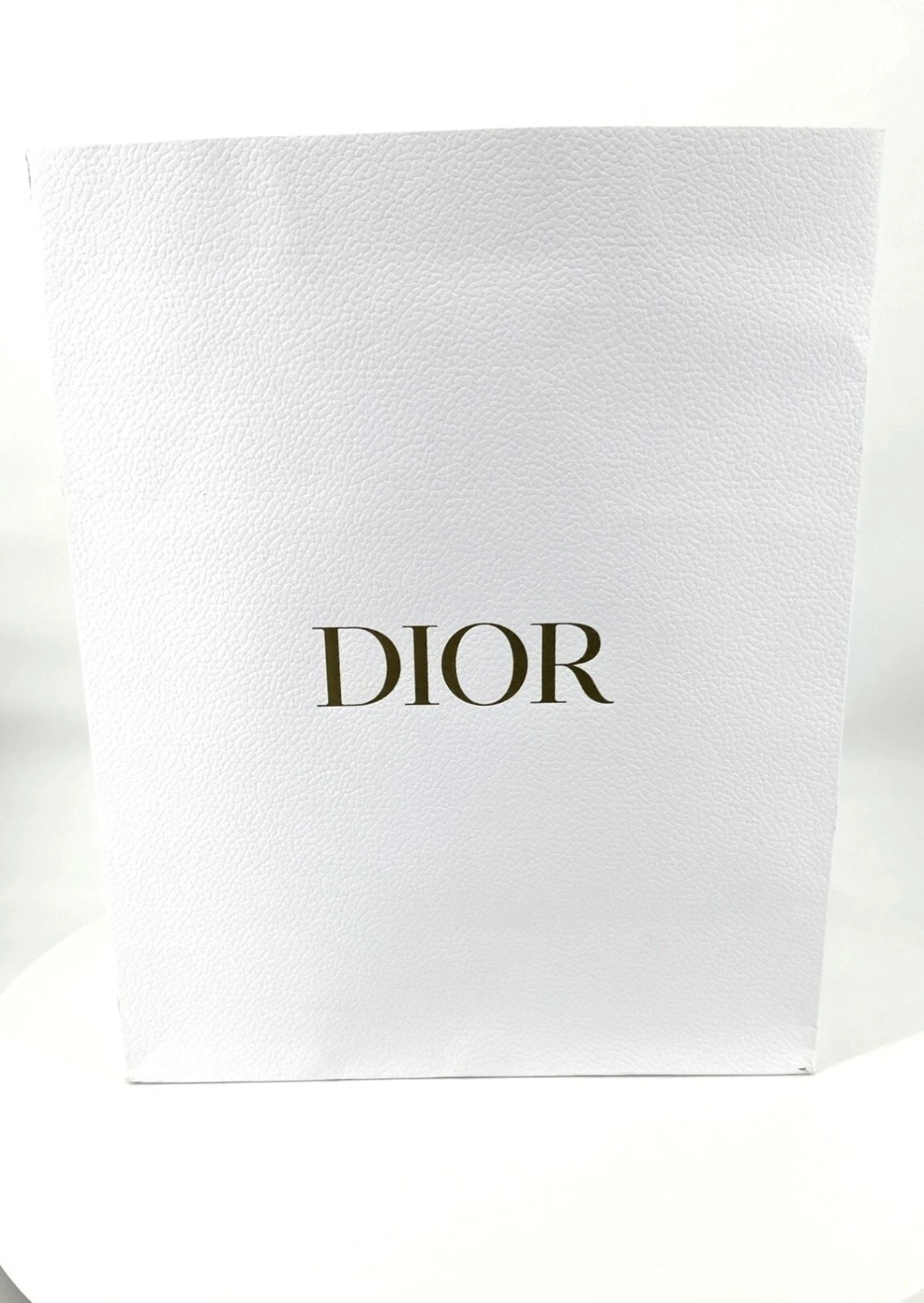 Sac cadeau en papier texturé blanc Dior avec logo doré et poignées corde XXL